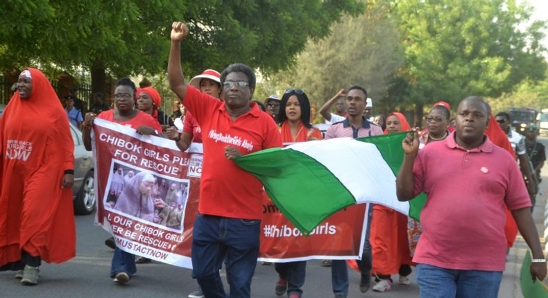 Activists of the online movement #bringbackourgirls demonstrate during a march in Abuja, on January 8, 2017, to mark the 1000 days since the mass abduction of the Chibok school girls