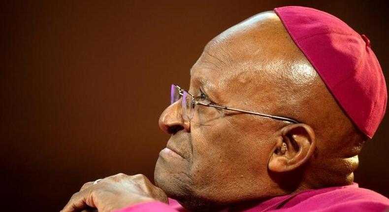 The former Anglican archbishop of Cape Town Desmond Tutu waits to receive the 2013 Templeton Prize at the Guildhall in central London on May 21, 2013.  REUTERS/Paul Hackett/File Photo