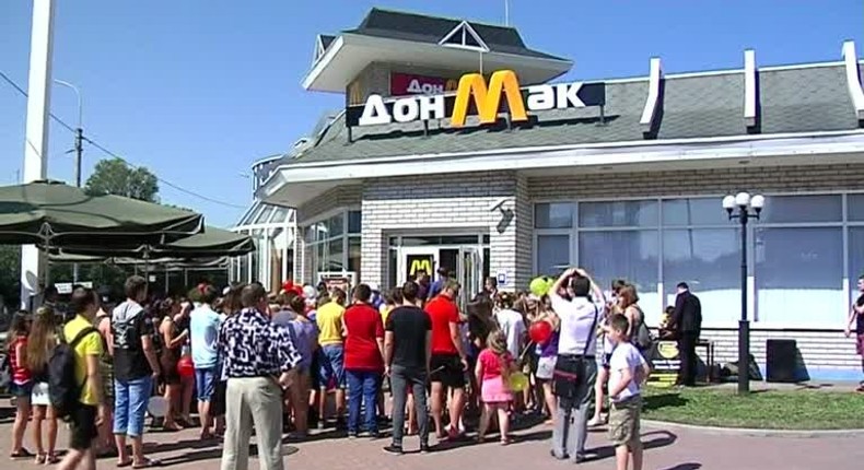 Customers stand outside of a DonMak restaurant in Donetsk, Ukraine in 2016