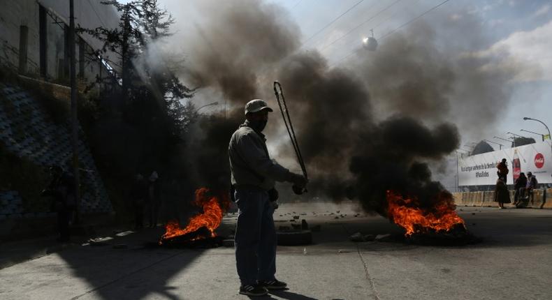 A supporter of Bolivian ex-president Evo Morales is seen protesting at a blockade in El Alto on August 10, 2020