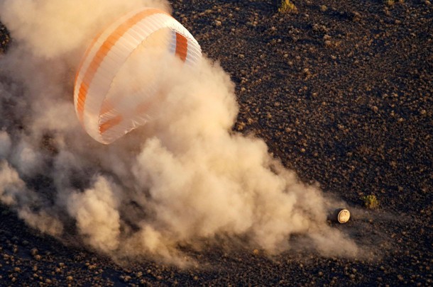 The Soyuz TMA-20M spacecraft capsule carrying International Space Station (ISS) crew lands near the 