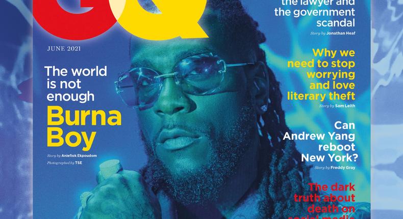Burna Boy wearing a clear Louis Vuitton suit on the cover on GQ {twitter/britishGQ}