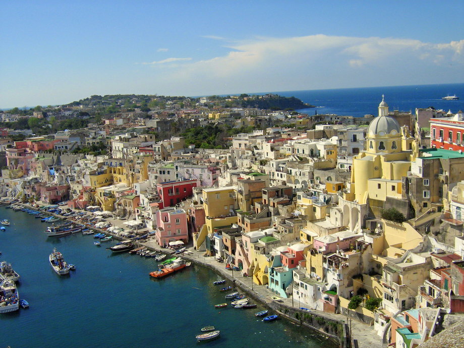 If you're in a search of a relaxed vacation, look no further than the island of Procida, located in the Bay of Naples in Italy. Offering a more authentic atmosphere than the touristy islands of Capri and Ischia, Procida has a picturesque setting of lemon groves, pastel houses, bustling bars, and waterfront restaurants serving classic Italian cuisine.