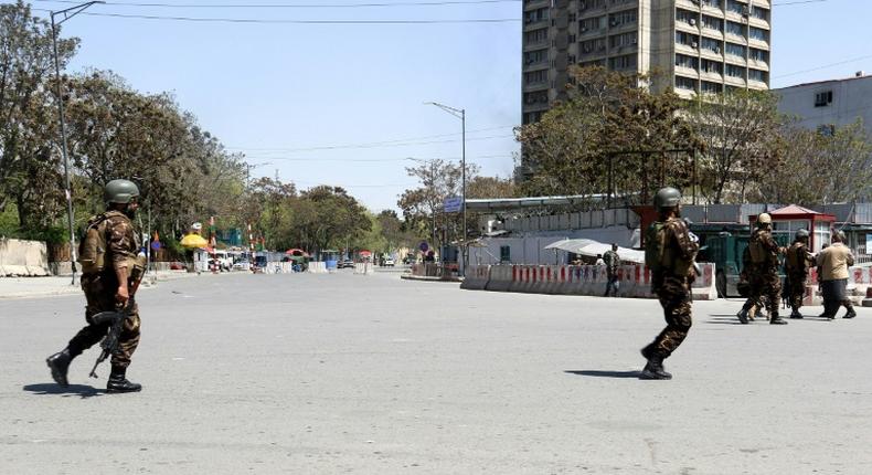 IS claimed responsibility for an attack on a government ministry in Kabul that killed at least seven civilians and three Afghan troops