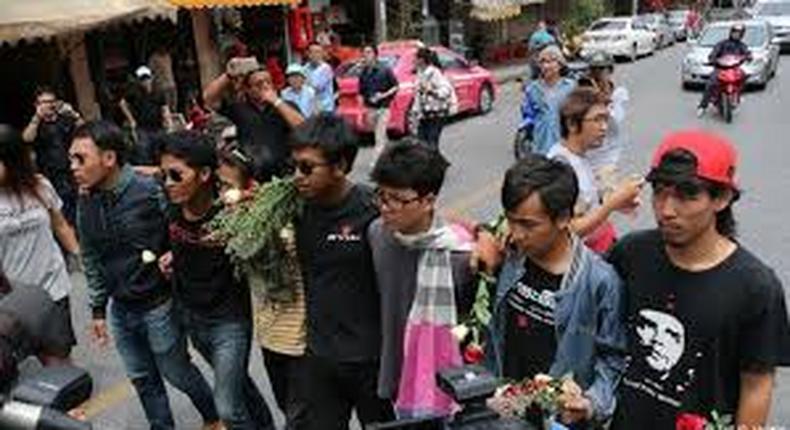 Thai military court releases 14 student protesters