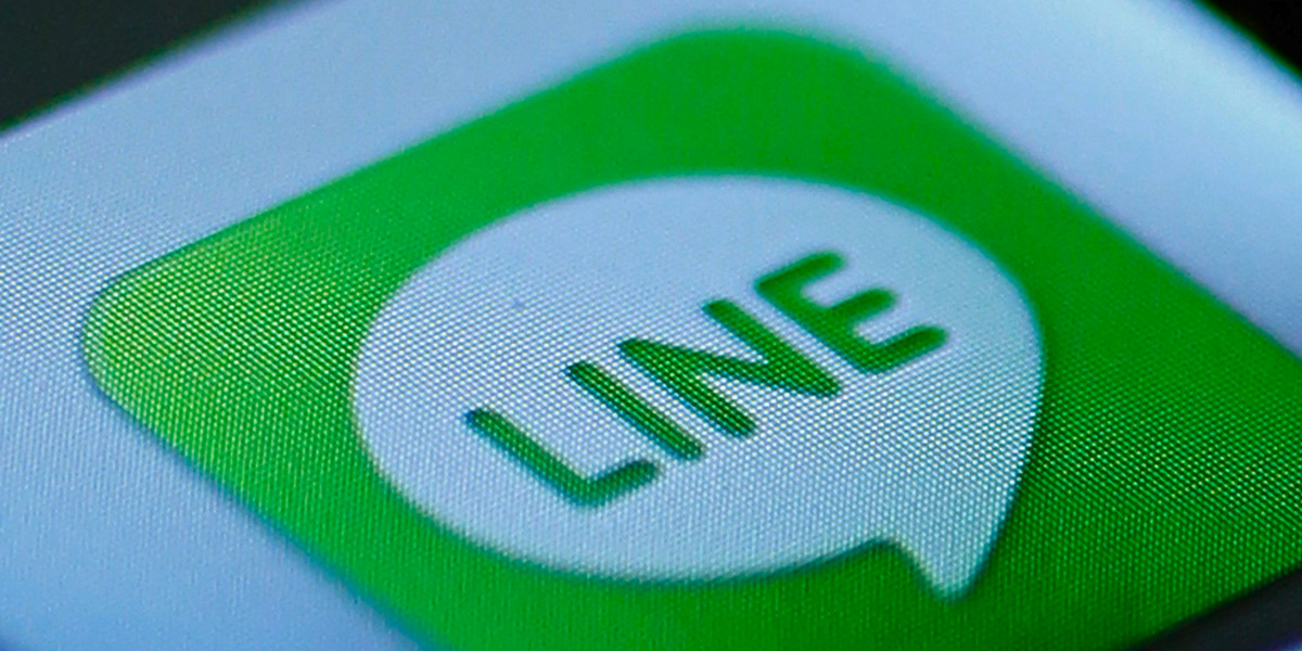 The icon of the free communication app Line pictured on an iPhone in this photo illustration in Tokyo in 2012.