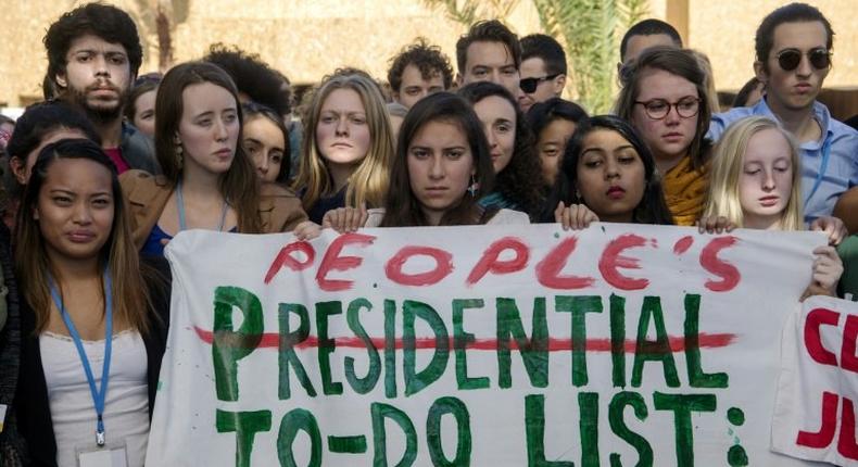 American students protest outside the UN climate talks in Marrakesh in reaction to Donald Trump's victory in the US presidential election