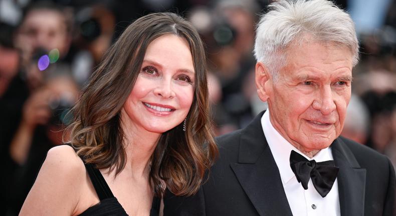 Calista Flockhart and Harrison Ford attend the Indiana Jones And The Dial Of Destiny red carpet during the 76th annual Cannes film festival at Palais des Festivals on May 18, 2023 in Cannes, France.Stephane Cardinale/Corbis via Getty Images