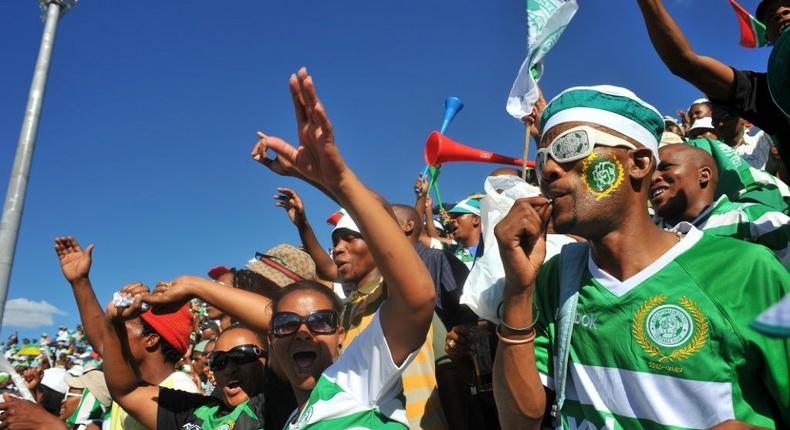 Supporters of South African top-flight club Bloemfontein Celtic cheering their team Creator: ALEXANDER JOE