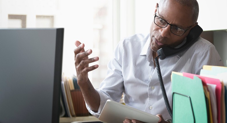 Man making a phone call for illustrative purposes