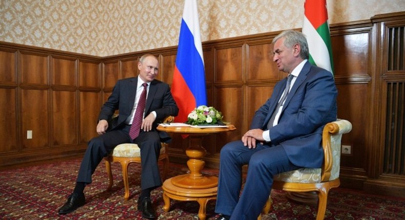 Russian President Vladimir Putin, left, meeting with Raul Khadzhimba, the leader of Georgia's breakaway region of Abkhazia