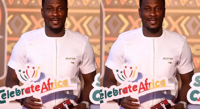 Africa is drooling over Asamoah Gyan’s all-white kaftan at AFCON draw