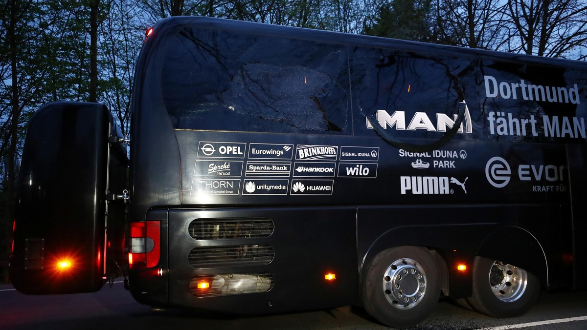 FILE PHOTO: The Borussia Dortmund team bus is seen after an explosion near their hotel before the game