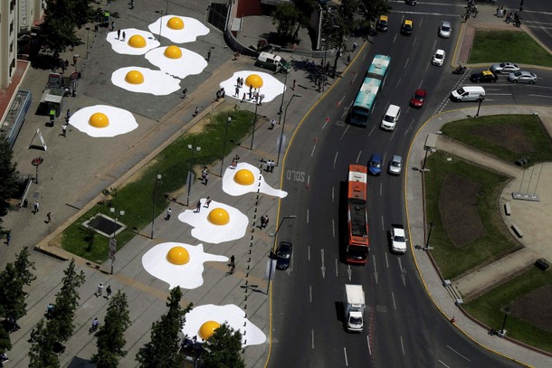 Giant fried eggs art installation are seen as part of Hecho en Casa (Made at home) urban artwork f