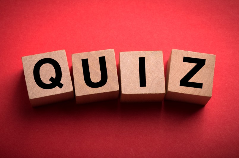 quiz Quiz,Concept,Wooden,Blocks,Isolated,On,Red,Background.