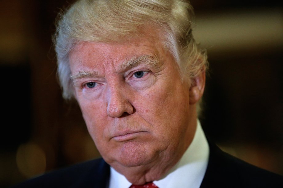 U.S. President-elect Donald Trump listens to questions from reporters while appearing with Alibaba Executive Chairman Jack Ma after their meeting at Trump Tower in New York, U.S., January 9, 2017.