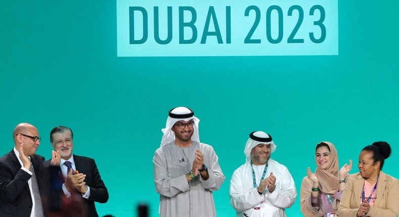 COP28 president Sultan Ahmed Al Jaber applauds officials at the UN climate summit in Dubai.GIUSEPPE CACACE