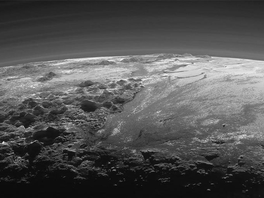 A close-up view of the rugged, icy mountains and flat ice plains on Pluto is seen in an image from NASA's New Horizons spacecraft