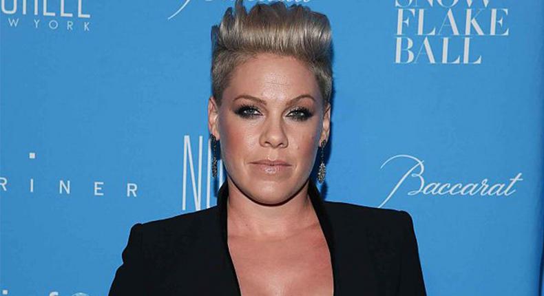 Pink shares a post of breastfeeding her son.