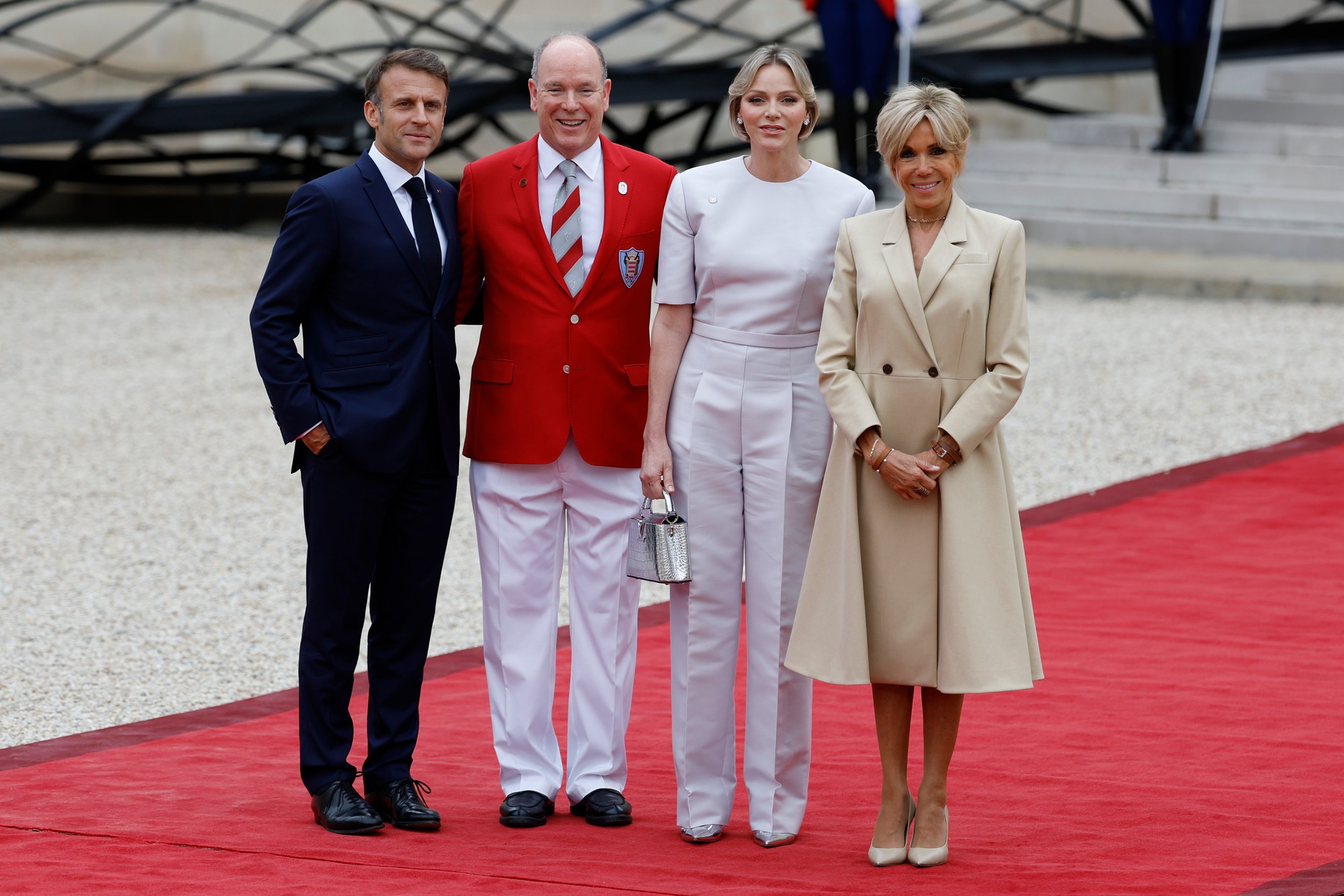 Francúzsky prezident Emmanuel Macron, Brigitte Macron, monacké knieža Albert II. a monacká kňažná Charlene.
