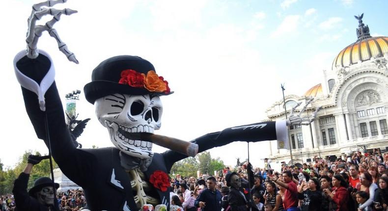 Floats depicting Catrinas and other death-related characters march during the first big parade to celebrate the Day of the Dead in Mexico City