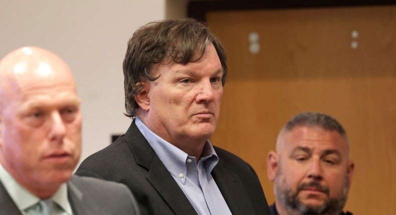 Gilgo Beach serial killings suspect Rex Heuermann, center, at Suffolk County Supreme Court appearance with defense lawyer Michael Brown, left.AP/James Carbone/Newsday