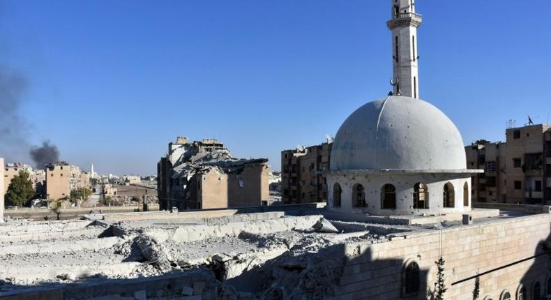 A picture taken on November 27, 2016 shows a damaged mosque in the Masaken Hanano district in eastern Aleppo, a day after Syrian pro-government forces reseized it from rebel fighters