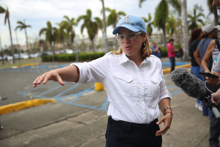 San Juan Mayor Carmen Yulin Cruz speaks to the media as she arrives at the temporary government center setup at the Roberto Clemente stadium in the aftermath of Hurricane Maria on September 30, 2017 in San Juan, Puerto Rico.