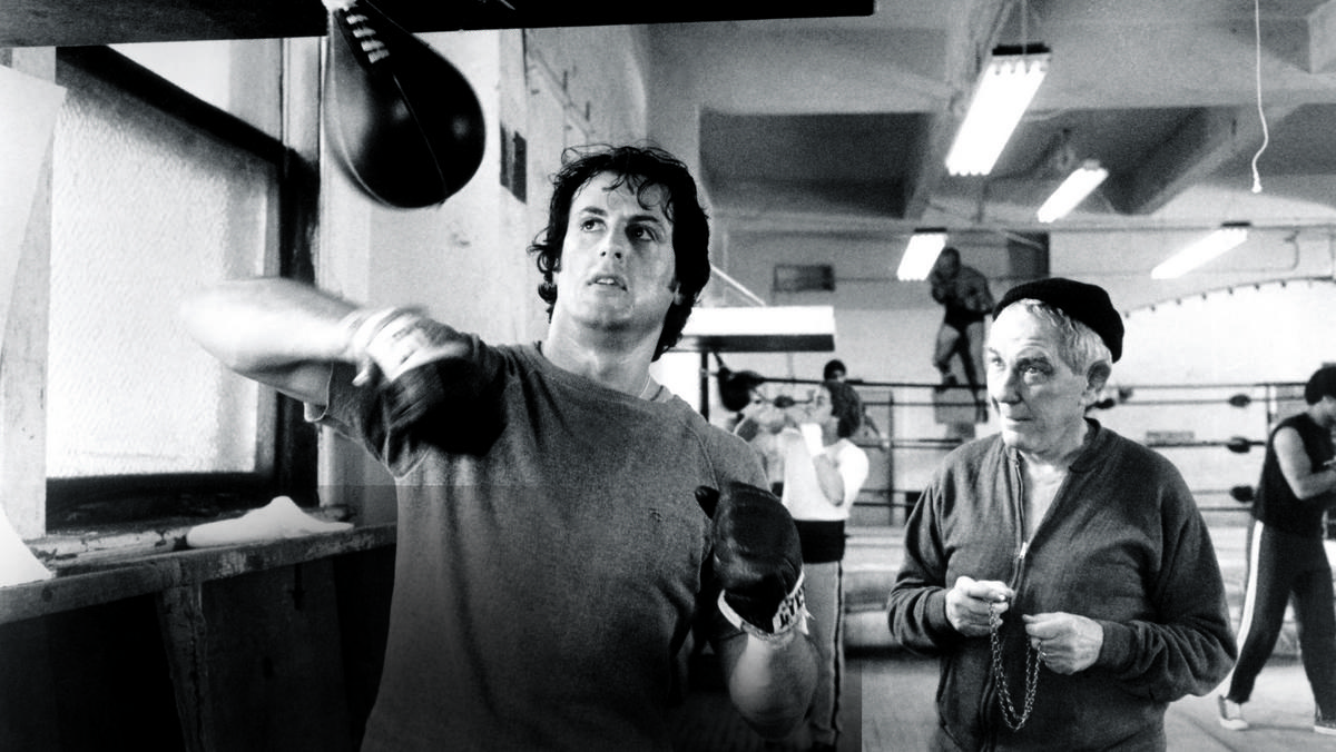 „Rocky II (1979),  na zdjęciu Sylvester Stallone i Burgess Meredith