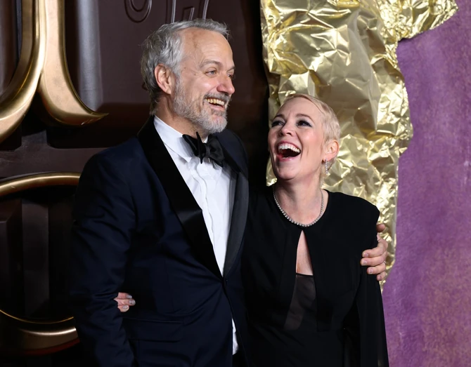 Olivija Kolman sa mužem