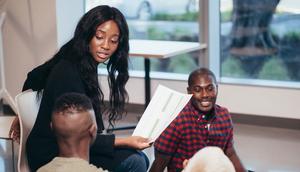 Coworkers in a heated discussion in an office setting [Image Credit: Kindel Media]