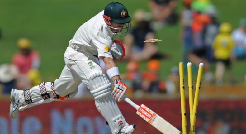 Australia's David Warner is run out, one of many wickets that sealed the side's fate against South Africa