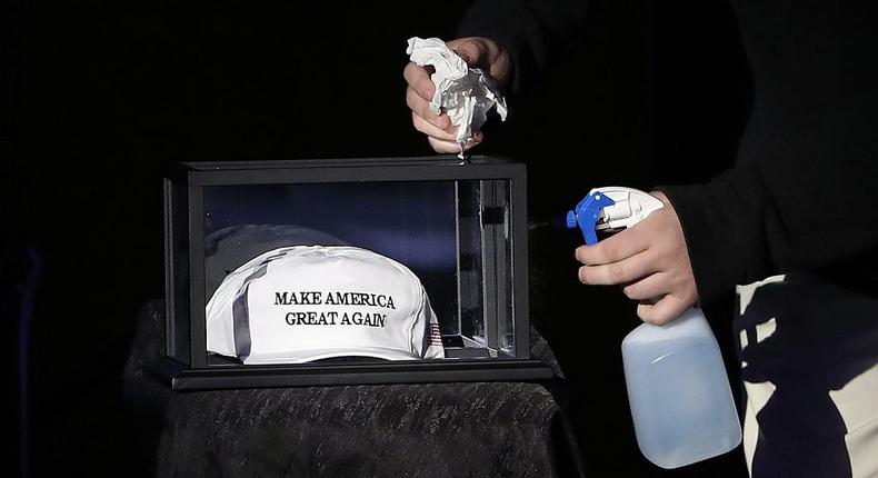 The Make America Great Again hat on display in a glass case at the Trump campaign's party on election night.