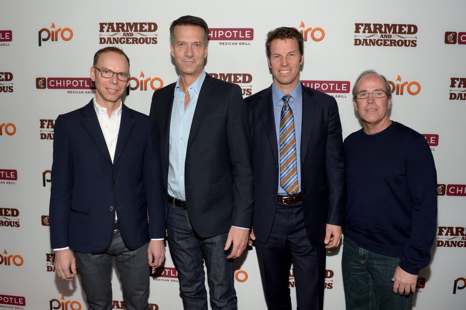 Chipotle co-CEO Steve Ells, Chief Marketing and Development Officer Mark Crumpacker, co-CEO Monty Moran, and Chief Finance Officer Jack Hartung walk the red carpet at the world premiere of "Farmed and Dangerous," a Chipotle/Piro production at the DGA Theater on February 11, 2014, in Los Angeles, California.