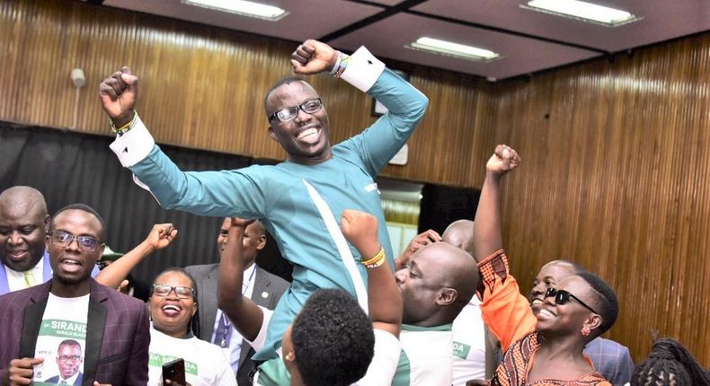 Supporters lifting their candidate shoulder high following submission of his nomination papers on Tuesday