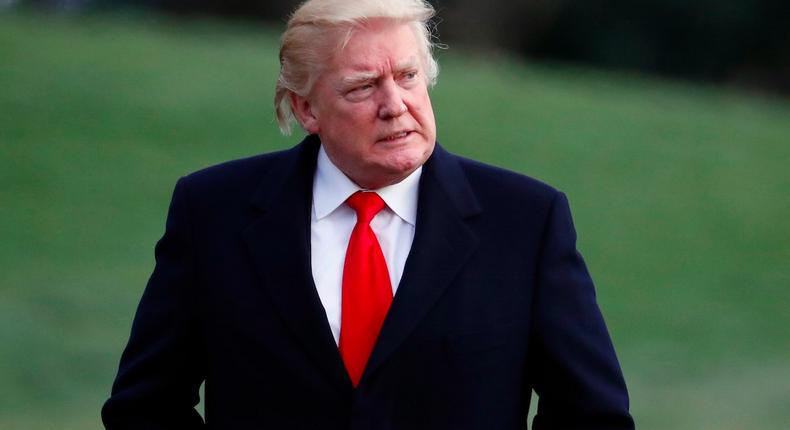 President Donald Trump walks to the White House after arriving on Marine One, Sunday, March 19, 2017, in Washington. Trump is returning from a trip to his Mar-a-Lago estate in Palm Beach, Fla.