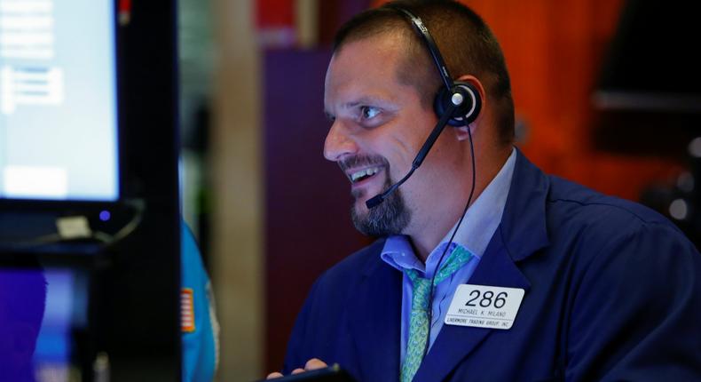 FILE PHOTO: A trader works on the floor at the New York Stock Exchange (NYSE) in New York, U.S., August 14, 2019. REUTERS/Eduardo Munoz