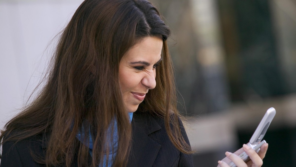 Woman holding a cell phone