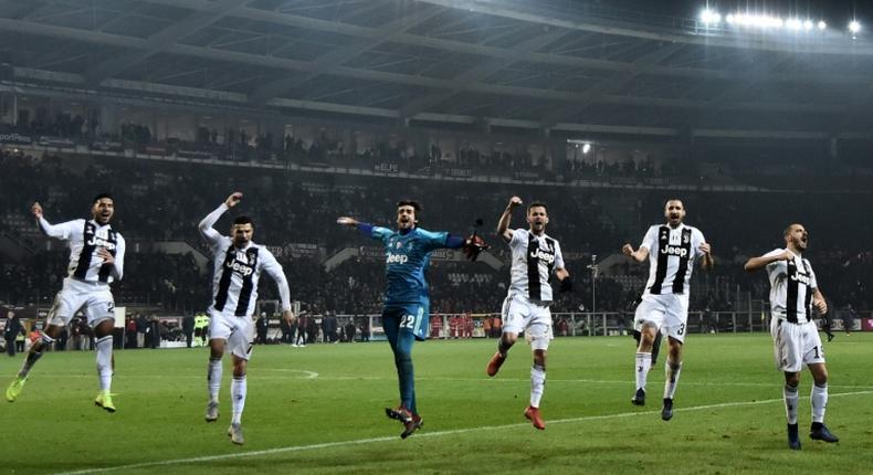 In the groove: Cristiano Ronaldo (Second from L) celebrates with his Juventus teammates after beating Torino