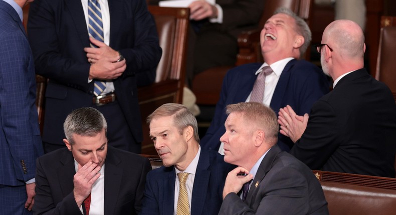 Ahead of the first vote, former Speaker Kevin McCarthy cackles as Rep. Jim Jordan speaks with an aide.Win McNamee/Getty Images