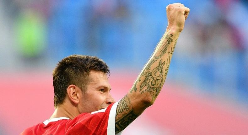 Russia's forward Fedor Smolov celebrates as he scores the team's second goal during the 2017 Confederations Cup group A football match against New Zealand June 17, 2017