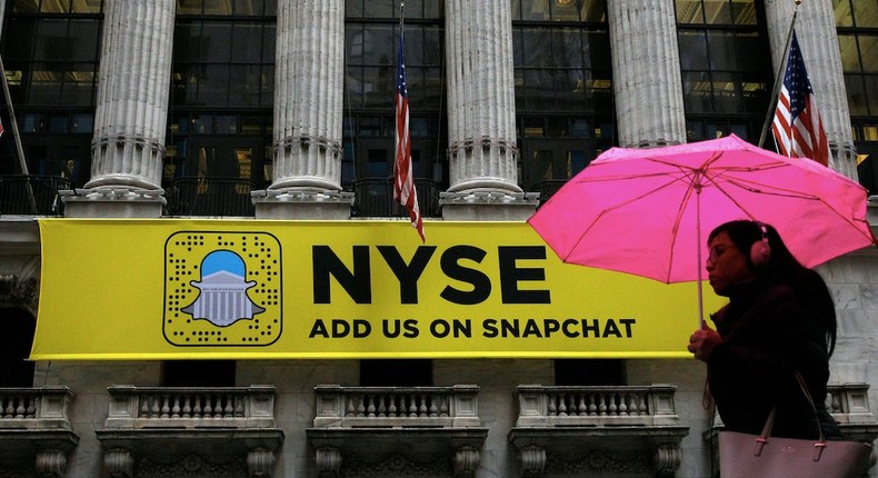 A Snapchat sign hangs on the facade of the New York Stock Exchange (NYSE) in New York City, U.S., January 24, 2017