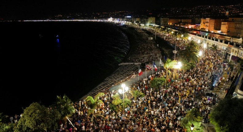 Crowds massing on Nice's  Promenade des Anglais esplanade for electro house music producer The Avener's set