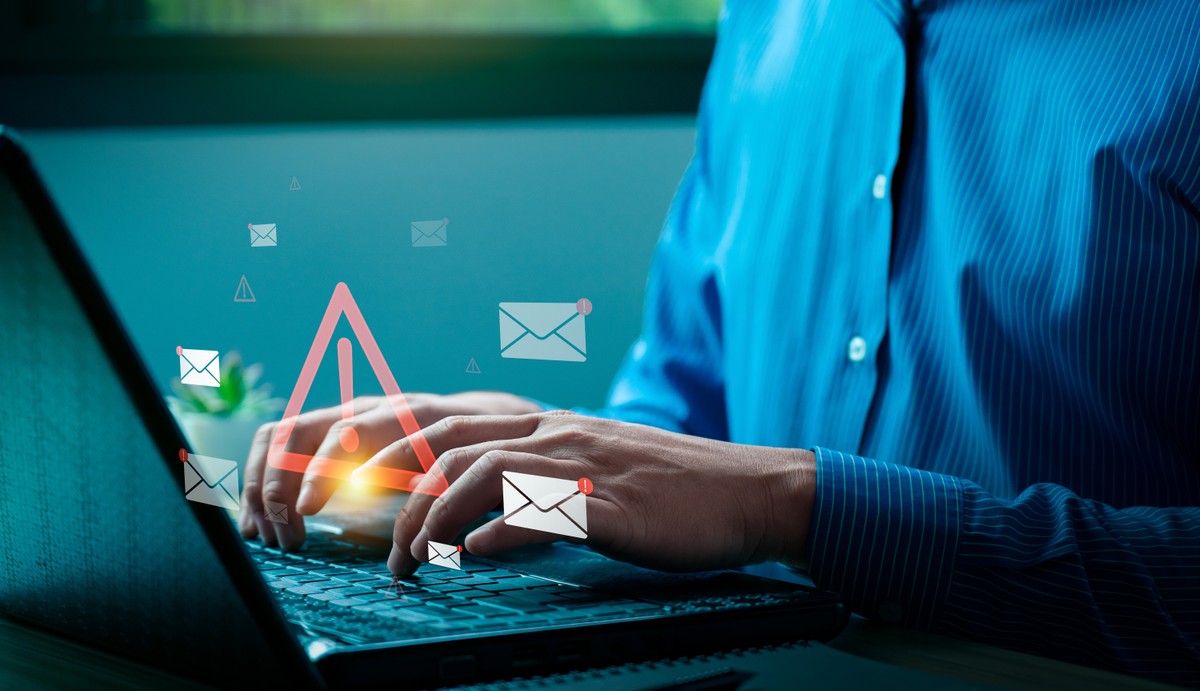 Cybersecurity,Email,Threat,Concept,With,Businessman,Receiving,Fraudulent,Messages,,Highlighting