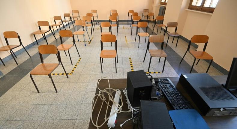 One metre apart: at Rome's Luigi Einaudi technical high school, staff have been setting up classrooms for pupils' return