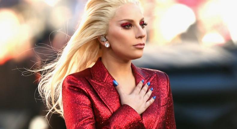 Lady Gaga in custom Gucci pantsuit at the 2016 Super Bowl