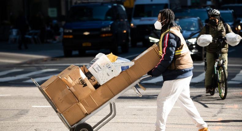 UPS employee delivers packages. Noam Galai/Getty Images