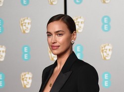 Marynarka z dekoltem do pępka, a pod nią NIC. Irina Shayk skutecznie kusiła nagimi piersiami na gali BAFTA. FOTO
