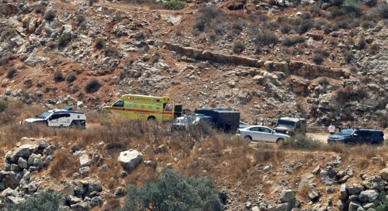 Israeli ambulance crews and security forces deploy to the scene of a bomb attack near the Israeli settlement of Dolev in the occupied West Bank on August 23, 2019