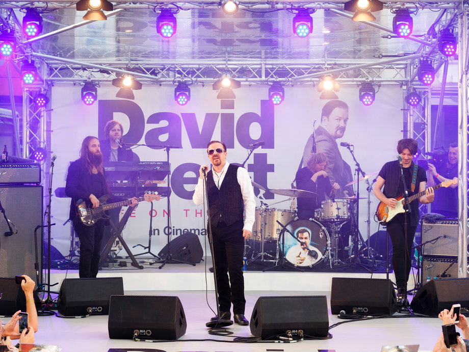 Gervais performs as David Brent with his band Foregone Conclusion.